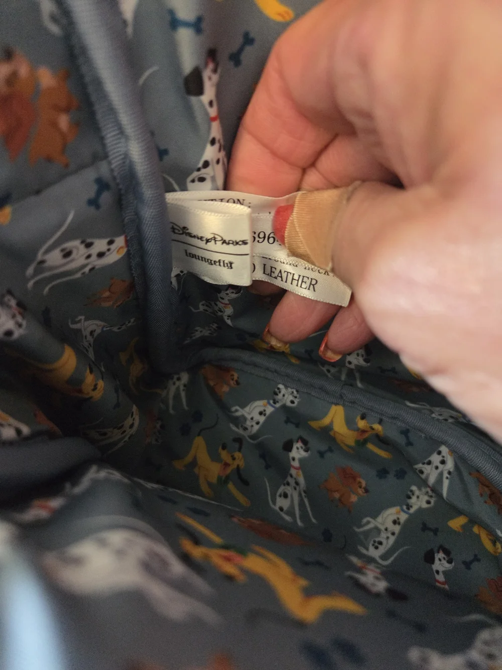 Loungefly Disney Parks Mini Backpack Festuring Rolly, Lady & Pluto